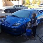 kids washing Lamborghini Diablo